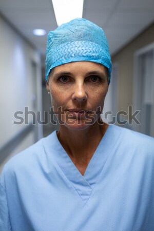 Portrait of male surgeon standing with arms crossed Stock photo © wavebreak_media