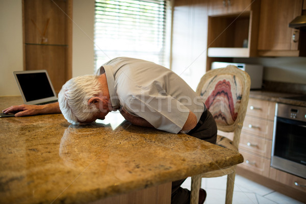Senior man suffering from heart attack in the kitchen Stock photo © wavebreak_media