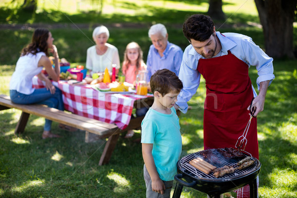 Father and son barbequing in the park Stock photo © wavebreak_media