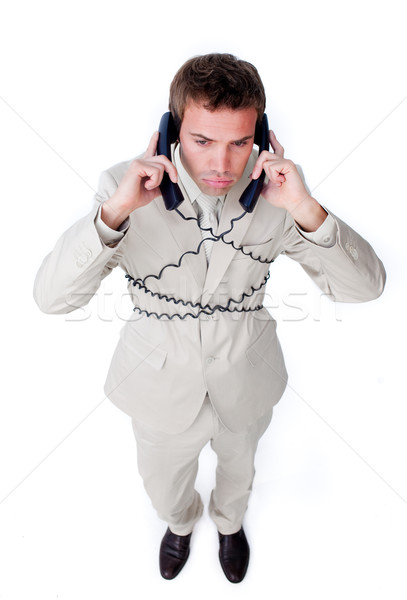 Bored businessman tangle up in phone wires  Stock photo © wavebreak_media