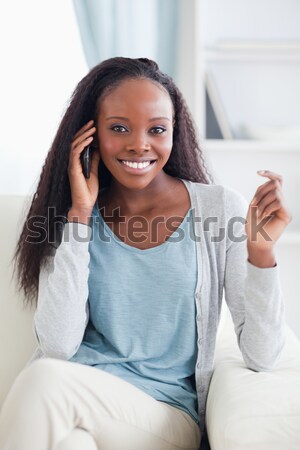 Stock photo: Close up of a woman waking up in her bedroom