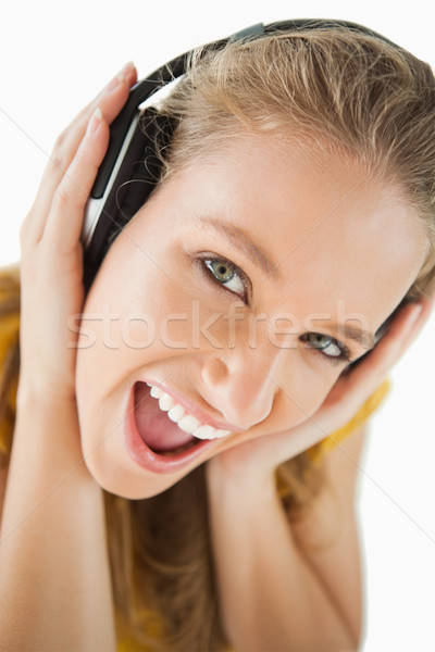 Blond student genieten muziek hoofdtelefoon Stockfoto © wavebreak_media