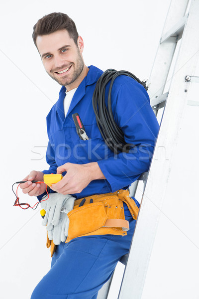 Gelukkig bouwvakker ladder portret witte Stockfoto © wavebreak_media