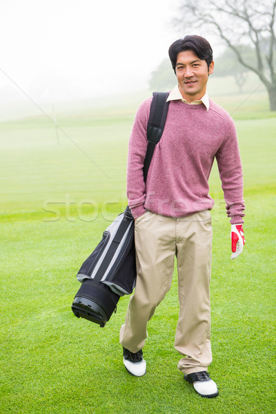 Stockfoto: Golfer · permanente · golftas · glimlachend · camera