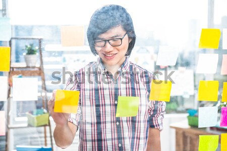 Woman in glasses in creative office Stock photo © wavebreak_media