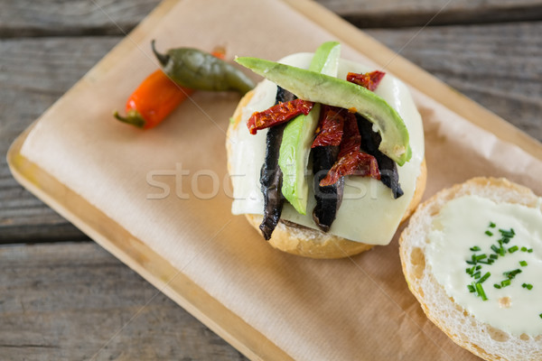 épices fromages chignon planche à découper papier Photo stock © wavebreak_media