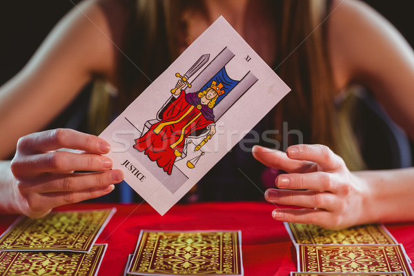 Stock photo: Fortune teller using tarot cards