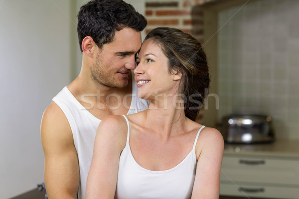 Happy young couple embracing each other Stock photo © wavebreak_media