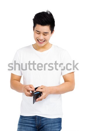счастливым молодым человеком бумажник белый деньги Сток-фото © wavebreak_media