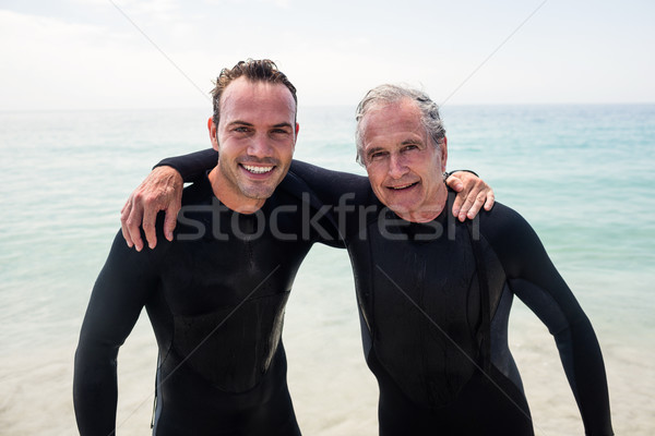 Portré boldog apa fia átkarol tengerpart napos idő Stock fotó © wavebreak_media