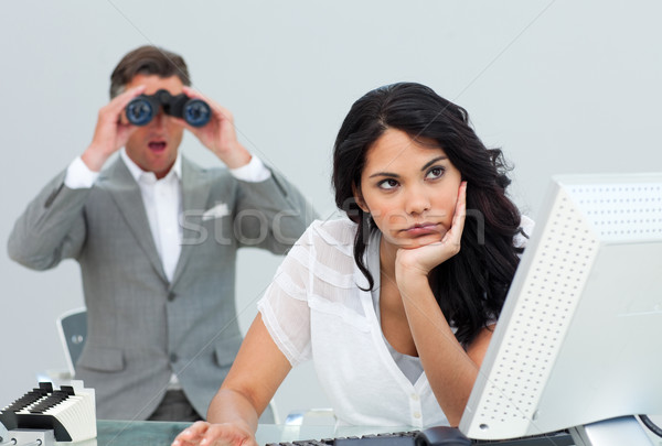Brunette businesswoman getting bored and her manager looking thr Stock photo © wavebreak_media