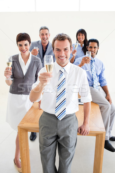 Több nemzetiségű üzletemberek pirít pezsgő iroda üzlet Stock fotó © wavebreak_media