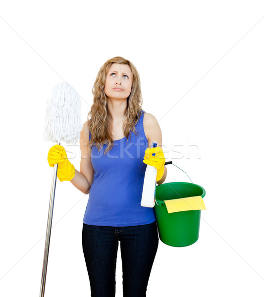 Thinking woman with cleaning utensils against white background Stock photo © wavebreak_media