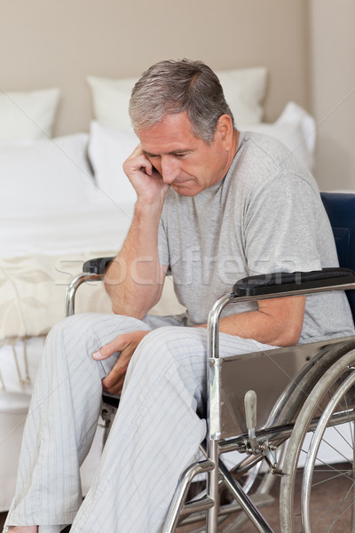 Thoughtful senior man in his wheelchair Stock photo © wavebreak_media