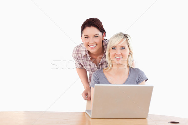 Best Friends with a laptop in a studio Stock photo © wavebreak_media