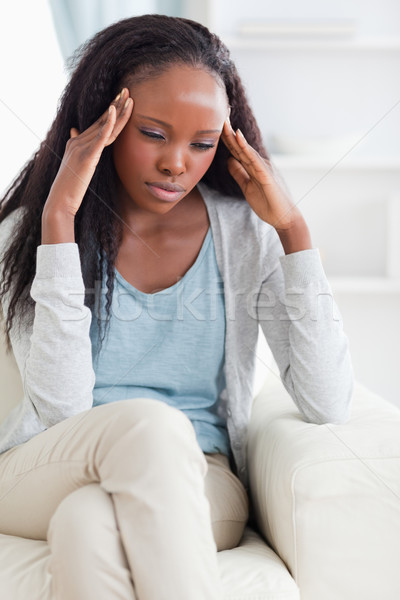 Close up of young woman having a headache Stock photo © wavebreak_media