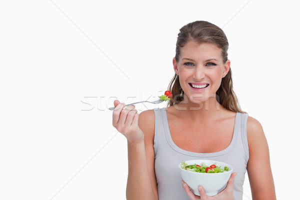 [[stock_photo]]: Femme · manger · salade · blanche · alimentaire · sourire