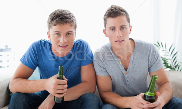 Paar Jungs schauen Kamera beide halten Stock foto © wavebreak_media