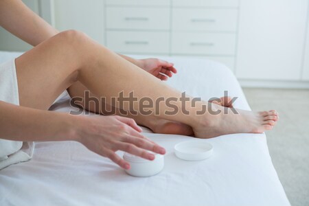 Doctor putting his forefinger on a barefoot in a room Stock photo © wavebreak_media