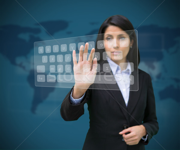 Frau anfassen digitalen Tastatur blau Weltkarte Stock foto © wavebreak_media