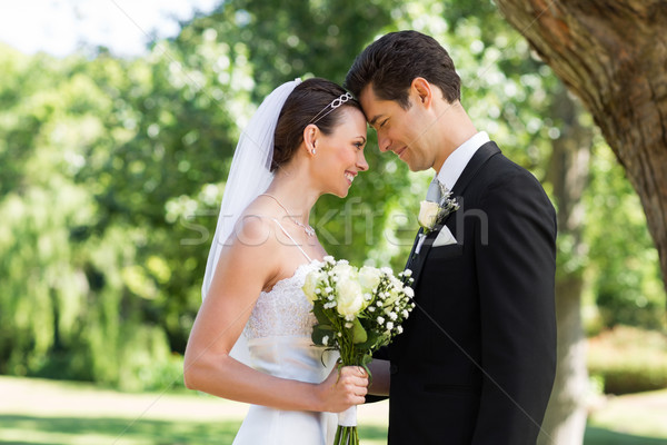 Loving newly wed couple in garden Stock photo © wavebreak_media