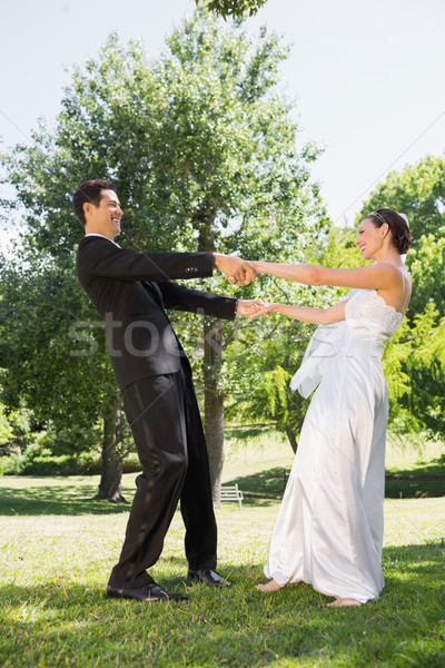 Newly wed couple enjoying in park Stock photo © wavebreak_media