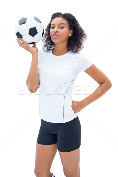 Pretty football fan in white holding ball  Stock photo © wavebreak_media