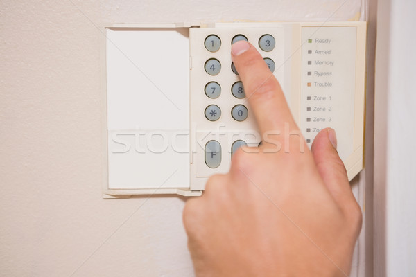 Man arming a home alarm Stock photo © wavebreak_media