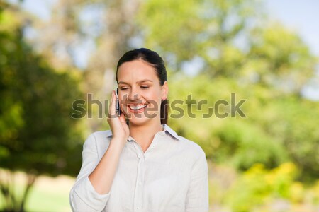 Portret toevallig brunette glimlachend park gelukkig Stockfoto © wavebreak_media