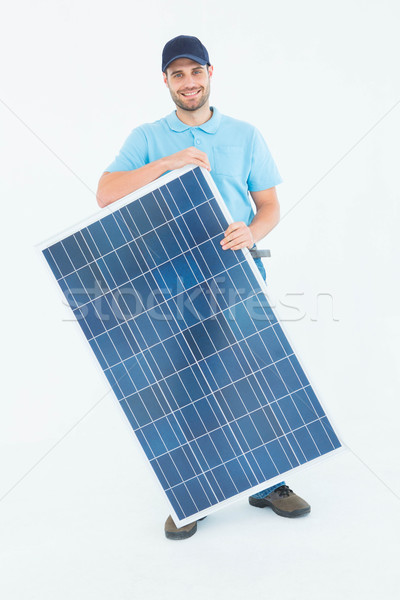Glimlachend bouwvakker zonnepaneel portret witte Stockfoto © wavebreak_media