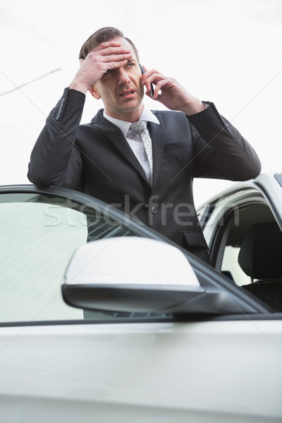 Ideges üzletember telefon autóparkoló üzlet autó Stock fotó © wavebreak_media