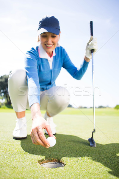 Sorridere signora golfista verde Foto d'archivio © wavebreak_media