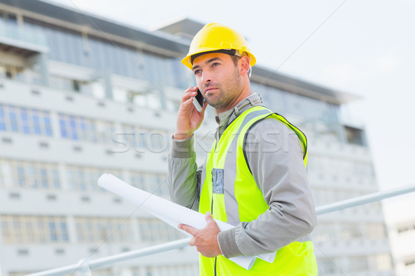 Architecte blueprints téléphone portable bâtiment Homme homme [[stock_photo]] © wavebreak_media