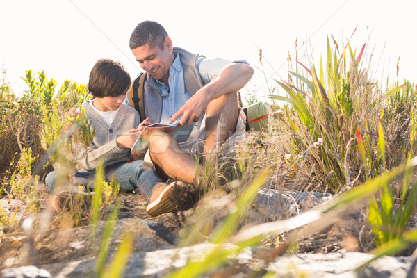 Father and son hiking in the mountains Stock photo © wavebreak_media