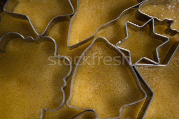 Overhead view of pastry cutters on dough Stock photo © wavebreak_media