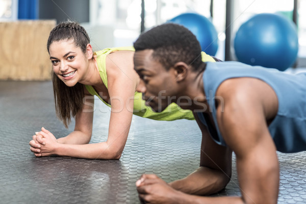 Athletic man and woman working out Stock photo © wavebreak_media