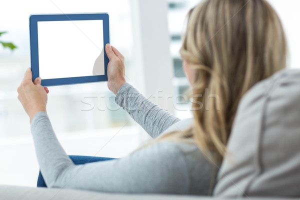 Pregnant woman using digital tablet Stock photo © wavebreak_media