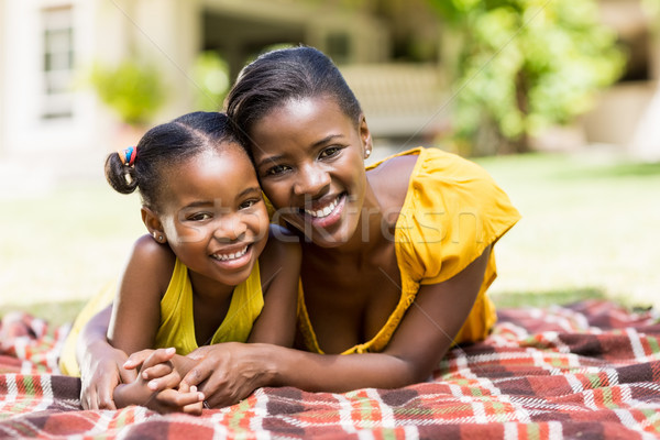 Famille heureuse posant ensemble parc femme fille [[stock_photo]] © wavebreak_media