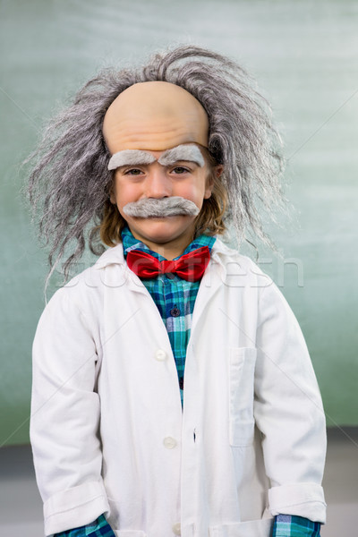Souriant garçon scientifique permanent bord portrait [[stock_photo]] © wavebreak_media