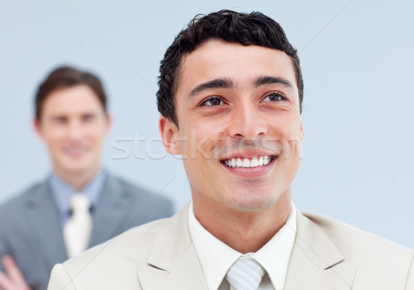 Stock photo: Confident business people standing in a row 