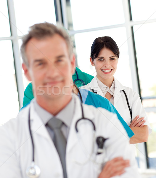 Feminino médico sorridente câmera mulher atraente Foto stock © wavebreak_media