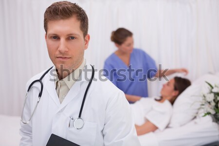 Stock photo: Mature woman talking with her nurse