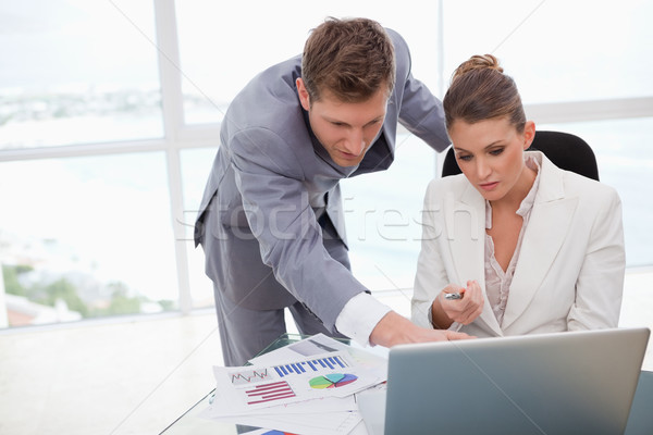 Business team working on poll results together Stock photo © wavebreak_media