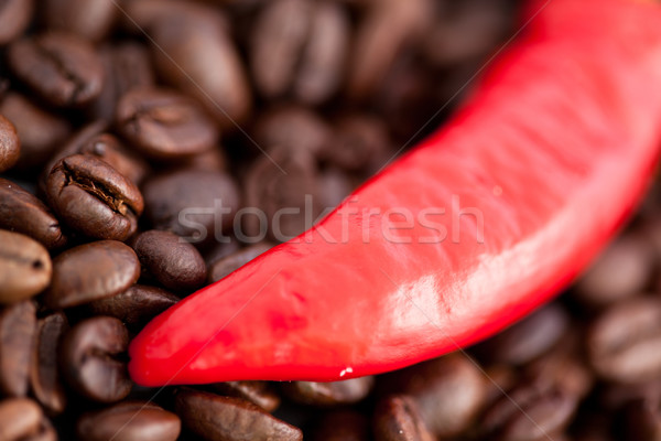 Close up of a red pepper and coffee beans together Stock photo © wavebreak_media