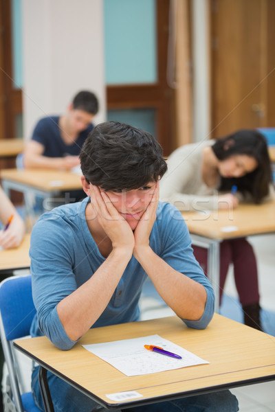 Estudante olhando desamparado exame ouvir Foto stock © wavebreak_media