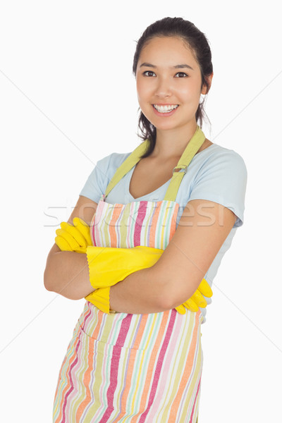 Souriant jeune femme bras gants en caoutchouc tablier [[stock_photo]] © wavebreak_media