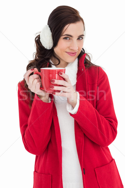 Woman in winter clothes holding a mug Stock photo © wavebreak_media