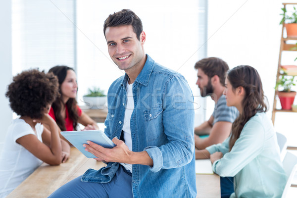 Souriant jeunes affaires comprimé portrait bureau [[stock_photo]] © wavebreak_media