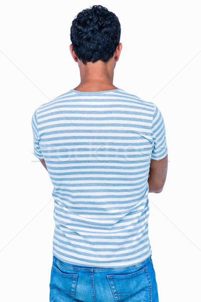 Rear view of man with arms crossed Stock photo © wavebreak_media