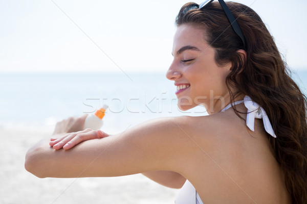 Zijaanzicht vrouw armen strand zee Stockfoto © wavebreak_media